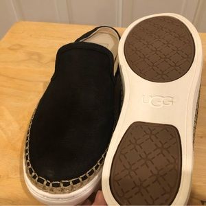 Ugg brand mules, black/white/tan, size 9. Never worn.